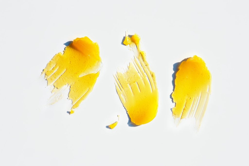 Macro photography of yellow CBD oil for health and wellness
